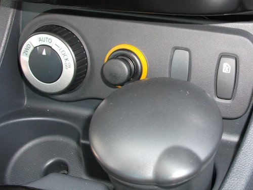 Drehknopf für die Allradsteuerung. 