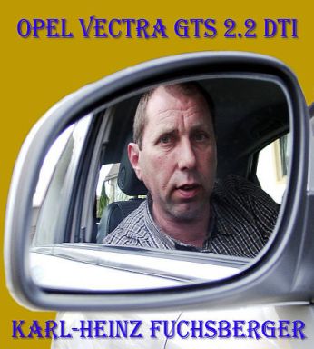 Heinz Fuchsberger im Außenspiegel seins Opel Vectra GTS. Heinz Fuchsberger im Außenspiegel seins Opel Vectra GTS.