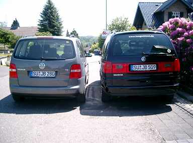 Sharan und Touran von hinten. Sharan und Touran von hinten.